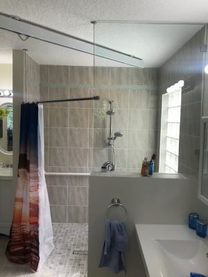 Bathroom with glass walls and walk in shower