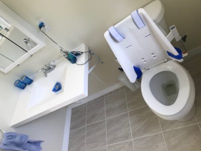 Toilet with seat brace