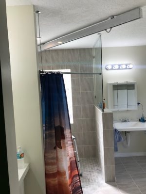 Shower with rail guide