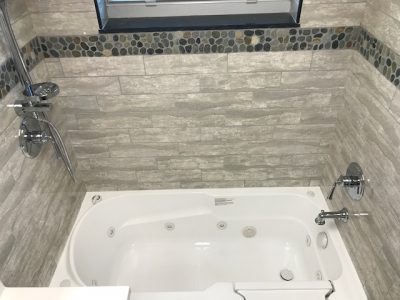 Granite tile tub enclosure